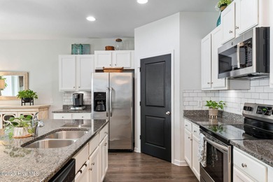 Enjoy space, privacy & upgrades in this gorgeous single story on Lennon Hills Golf Course in North Carolina - for sale on GolfHomes.com, golf home, golf lot