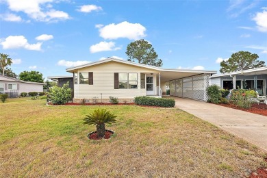 This 2 bedroom 2 bath home is situated on an oversized lot just on Bay Tree Golf Course in Florida - for sale on GolfHomes.com, golf home, golf lot