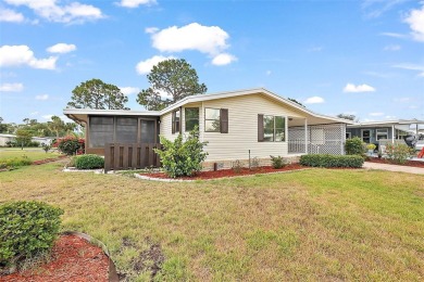 This 2 bedroom 2 bath home is situated on an oversized lot just on Bay Tree Golf Course in Florida - for sale on GolfHomes.com, golf home, golf lot