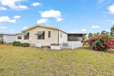 This 2 bedroom 2 bath home is situated on an oversized lot just on Bay Tree Golf Course in Florida - for sale on GolfHomes.com, golf home, golf lot