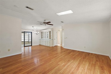 This 2 bedroom 2 bath home is situated on an oversized lot just on Bay Tree Golf Course in Florida - for sale on GolfHomes.com, golf home, golf lot