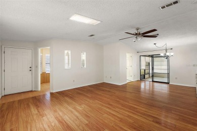 This 2 bedroom 2 bath home is situated on an oversized lot just on Bay Tree Golf Course in Florida - for sale on GolfHomes.com, golf home, golf lot