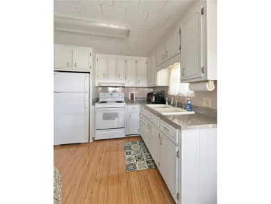 This beautifully maintained 2-bedroom, 2-bath home is truly on Fairway Village Golf Course in Florida - for sale on GolfHomes.com, golf home, golf lot