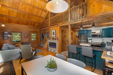Escape to 'Rustic Refuge', a charming LOG CHALET nestled within on Alpine Lake Resort in West Virginia - for sale on GolfHomes.com, golf home, golf lot