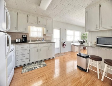 This beautifully maintained 2-bedroom, 2-bath home is truly on Fairway Village Golf Course in Florida - for sale on GolfHomes.com, golf home, golf lot
