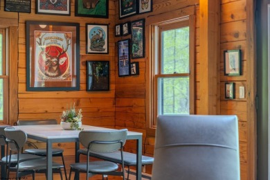 Escape to 'Rustic Refuge', a charming LOG CHALET nestled within on Alpine Lake Resort in West Virginia - for sale on GolfHomes.com, golf home, golf lot