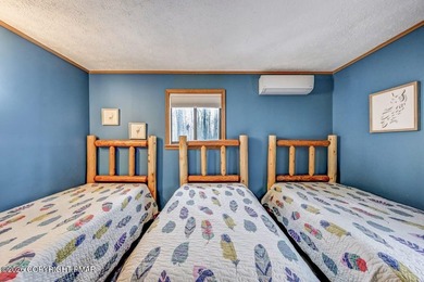 Unwind from a busy life to 1266 Longrifle. Sharing the relaxed on Lake Naomi Timber Trails Golf Club in Pennsylvania - for sale on GolfHomes.com, golf home, golf lot