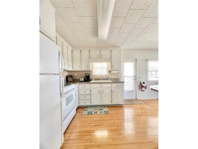 This beautifully maintained 2-bedroom, 2-bath home is truly on Fairway Village Golf Course in Florida - for sale on GolfHomes.com, golf home, golf lot