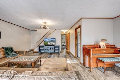 Unwind from a busy life to 1266 Longrifle. Sharing the relaxed on Lake Naomi Timber Trails Golf Club in Pennsylvania - for sale on GolfHomes.com, golf home, golf lot