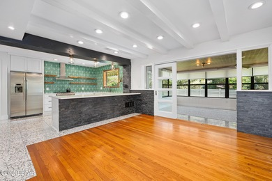 Fantastic mid-century with spectacular contemporary designer on Oceanside Country Club in Florida - for sale on GolfHomes.com, golf home, golf lot