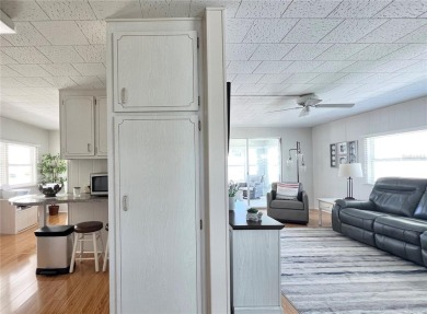 This beautifully maintained 2-bedroom, 2-bath home is truly on Fairway Village Golf Course in Florida - for sale on GolfHomes.com, golf home, golf lot