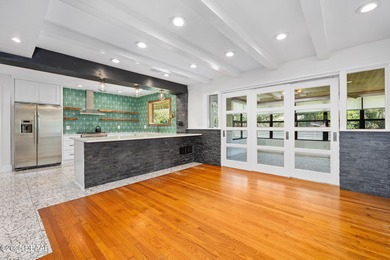 Fantastic mid-century with spectacular contemporary designer on Oceanside Country Club in Florida - for sale on GolfHomes.com, golf home, golf lot