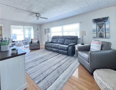 This beautifully maintained 2-bedroom, 2-bath home is truly on Fairway Village Golf Course in Florida - for sale on GolfHomes.com, golf home, golf lot