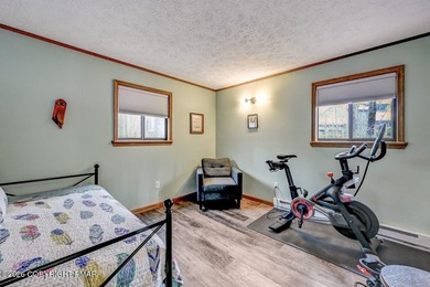 Unwind from a busy life to 1266 Longrifle. Sharing the relaxed on Lake Naomi Timber Trails Golf Club in Pennsylvania - for sale on GolfHomes.com, golf home, golf lot