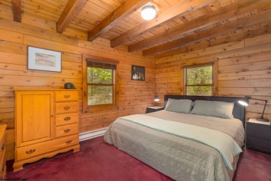 Escape to 'Rustic Refuge', a charming LOG CHALET nestled within on Alpine Lake Resort in West Virginia - for sale on GolfHomes.com, golf home, golf lot