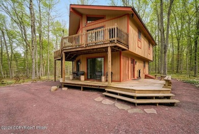 Unwind from a busy life to 1266 Longrifle. Sharing the relaxed on Lake Naomi Timber Trails Golf Club in Pennsylvania - for sale on GolfHomes.com, golf home, golf lot