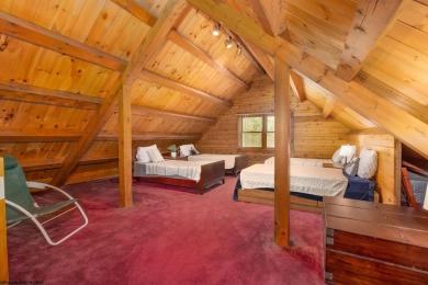 Escape to 'Rustic Refuge', a charming LOG CHALET nestled within on Alpine Lake Resort in West Virginia - for sale on GolfHomes.com, golf home, golf lot