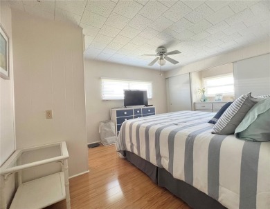 This beautifully maintained 2-bedroom, 2-bath home is truly on Fairway Village Golf Course in Florida - for sale on GolfHomes.com, golf home, golf lot