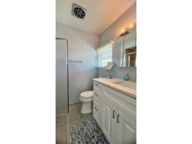 This beautifully maintained 2-bedroom, 2-bath home is truly on Fairway Village Golf Course in Florida - for sale on GolfHomes.com, golf home, golf lot