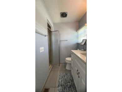 This beautifully maintained 2-bedroom, 2-bath home is truly on Fairway Village Golf Course in Florida - for sale on GolfHomes.com, golf home, golf lot
