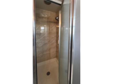 This beautifully maintained 2-bedroom, 2-bath home is truly on Fairway Village Golf Course in Florida - for sale on GolfHomes.com, golf home, golf lot