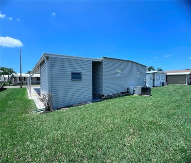 This beautifully maintained 2-bedroom, 2-bath home is truly on Fairway Village Golf Course in Florida - for sale on GolfHomes.com, golf home, golf lot