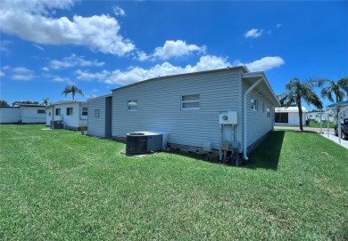 This beautifully maintained 2-bedroom, 2-bath home is truly on Fairway Village Golf Course in Florida - for sale on GolfHomes.com, golf home, golf lot