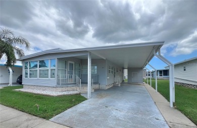 This beautifully maintained 2-bedroom, 2-bath home is truly on Fairway Village Golf Course in Florida - for sale on GolfHomes.com, golf home, golf lot