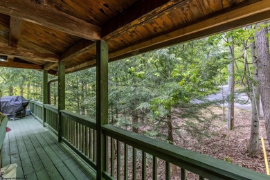 Escape to 'Rustic Refuge', a charming LOG CHALET nestled within on Alpine Lake Resort in West Virginia - for sale on GolfHomes.com, golf home, golf lot