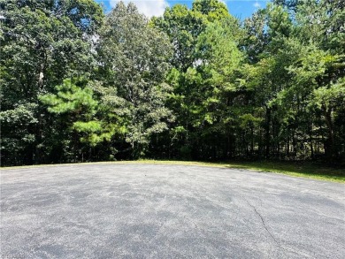 Discover the perfect place to build your dream home in the Heron on Old North State Club at Uwharrie Point Golf community in North Carolina - for sale on GolfHomes.com, golf home, golf lot