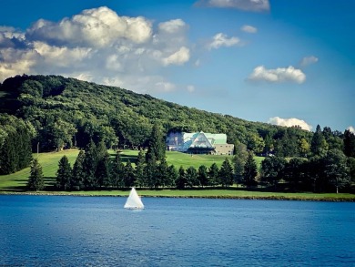 Escape to 'Rustic Refuge', a charming LOG CHALET nestled within on Alpine Lake Resort in West Virginia - for sale on GolfHomes.com, golf home, golf lot