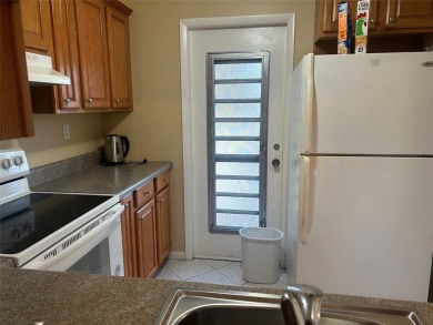 Welcome to this beautifully maintained 2-bedroom, 2-bathroom on Lauderhill Golf Course in Florida - for sale on GolfHomes.com, golf home, golf lot