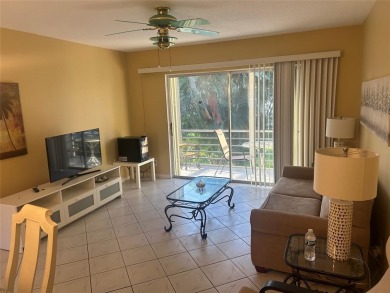 Welcome to this beautifully maintained 2-bedroom, 2-bathroom on Lauderhill Golf Course in Florida - for sale on GolfHomes.com, golf home, golf lot