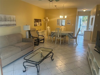 Welcome to this beautifully maintained 2-bedroom, 2-bathroom on Lauderhill Golf Course in Florida - for sale on GolfHomes.com, golf home, golf lot