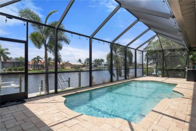 PUNTA GORDA ISLES WATERFRONT HOME W/91FT OF SEAWALL & SAIL on Saint Andrews South Golf Club in Florida - for sale on GolfHomes.com, golf home, golf lot