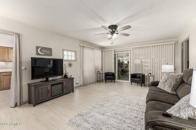 2 bed, 2 bath Sun City home with 1,659 sq ft and bonus room that on PalmBrook Country Club in Arizona - for sale on GolfHomes.com, golf home, golf lot