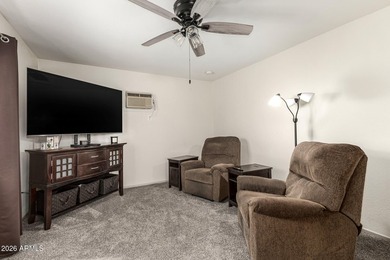 2 bed, 2 bath Sun City home with 1,659 sq ft and bonus room that on PalmBrook Country Club in Arizona - for sale on GolfHomes.com, golf home, golf lot