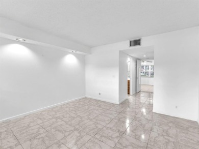 Bright & Clean first-floor 1-bedroom, 1-bathroom Century Village on Flamingo Lakes Country Club in Florida - for sale on GolfHomes.com, golf home, golf lot