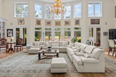 Nestled among almost 3 acres of longleaf pines, this exquisite on Pinewild Country Club of Pinehurst in North Carolina - for sale on GolfHomes.com, golf home, golf lot