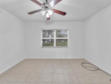 Bright & Clean first-floor 1-bedroom, 1-bathroom Century Village on Flamingo Lakes Country Club in Florida - for sale on GolfHomes.com, golf home, golf lot
