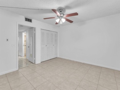 Bright & Clean first-floor 1-bedroom, 1-bathroom Century Village on Flamingo Lakes Country Club in Florida - for sale on GolfHomes.com, golf home, golf lot