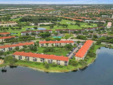 Bright & Clean first-floor 1-bedroom, 1-bathroom Century Village on Flamingo Lakes Country Club in Florida - for sale on GolfHomes.com, golf home, golf lot