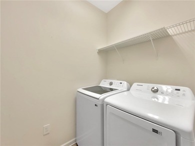 Elegant one-level living awaits in this premier 55+ on Canongate Golf At Sun City Peachtree in Georgia - for sale on GolfHomes.com, golf home, golf lot