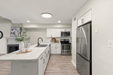 Completely renovated and move-in ready, this townhome offers the on Hilaman Park Golf Course in Florida - for sale on GolfHomes.com, golf home, golf lot