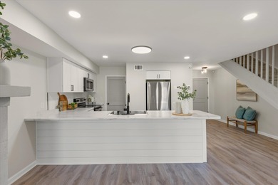 Completely renovated and move-in ready, this townhome offers the on Hilaman Park Golf Course in Florida - for sale on GolfHomes.com, golf home, golf lot