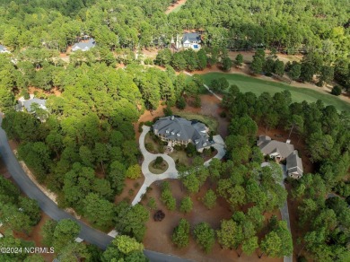 Nestled among almost 3 acres of longleaf pines, this exquisite on Pinewild Country Club of Pinehurst in North Carolina - for sale on GolfHomes.com, golf home, golf lot