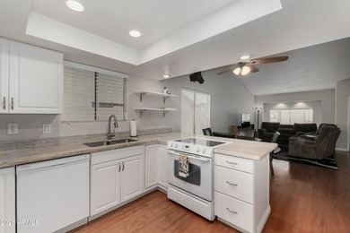 Charming 1409 sq ft twin home located in Camino Del Rey 55+ on Sunland Village Golf Club in Arizona - for sale on GolfHomes.com, golf home, golf lot