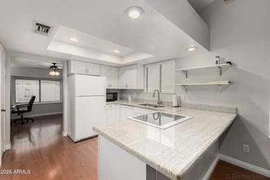 Charming 1409 sq ft twin home located in Camino Del Rey 55+ on Sunland Village Golf Club in Arizona - for sale on GolfHomes.com, golf home, golf lot