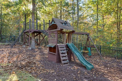 Located on a cul-de-sac street in Wake Forest's desirable on Heritage Golf Club in North Carolina - for sale on GolfHomes.com, golf home, golf lot