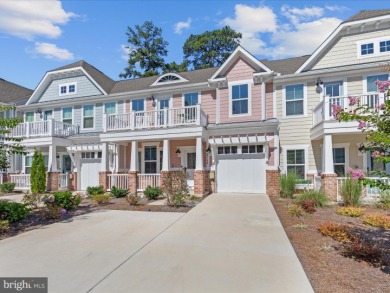 Welcome to 22198 Dune Circle, a gracious townhome villa offering on The Peninsula Golf and Country Club in Delaware - for sale on GolfHomes.com, golf home, golf lot